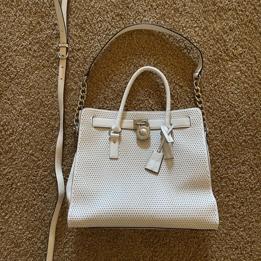 Michael Kors studded white purse.